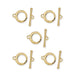 Five gold plated Craftsman toggle clasp sets, each with a hammered ring and bar, laid out on white