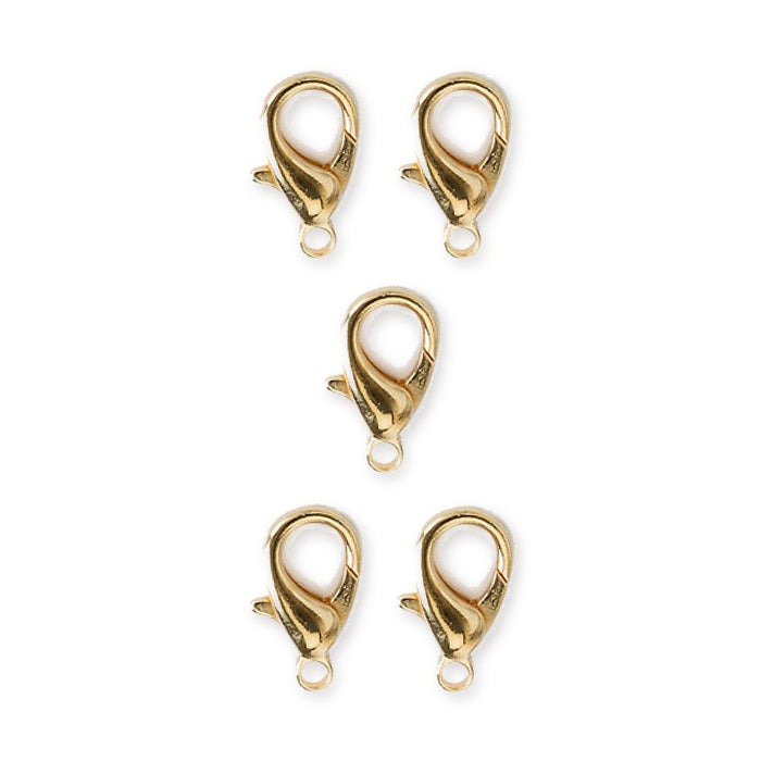 Five gold plated zinc alloy lobster clasps with open jump rings arranged in a pattern on white