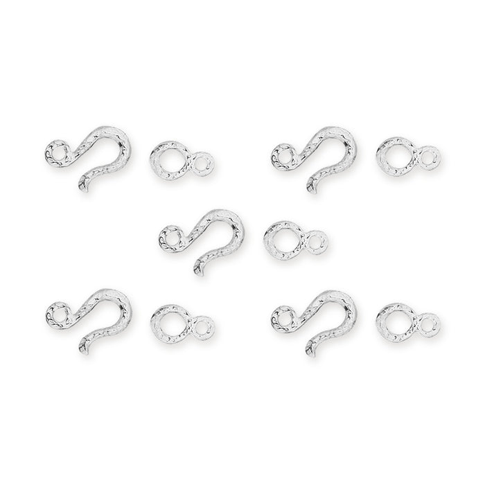 Five white bronze hammered hook and eye clasp sets laid out, each with a hook and a matching eye