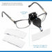 Clip-on LED magnifier on eyeglasses with callouts for the on/off light switch and powerful LED light