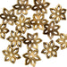Antiqued brass flower bead caps scattered, showing six-petal cutout design
