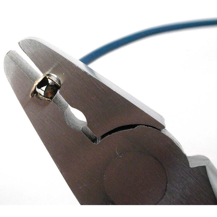 Close-up of the pliers jaws gripping a metal crimp on a blue cord