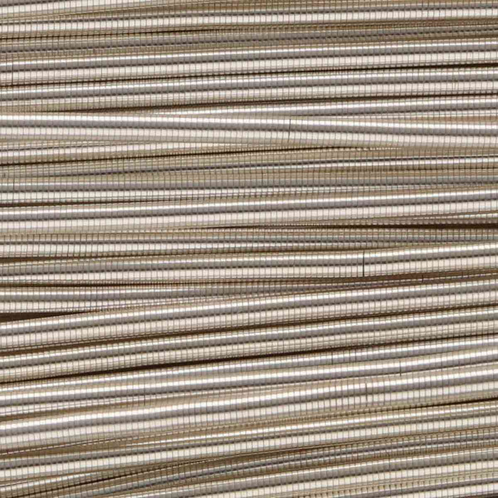 Close-up of silver French wire showing the tightly coiled, ridged surface texture