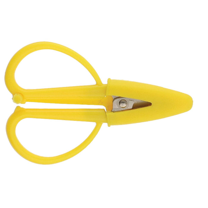Mini scissors with the yellow safety cap fitted over the blades, closed