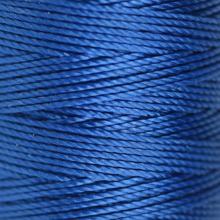 Close-up of twisted blue nylon cord texture on a Capri Blue S-Lon spool