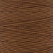 Close-up of the twisted 3-ply texture of milk chocolate brown S-Lon nylon cord wound on the spool