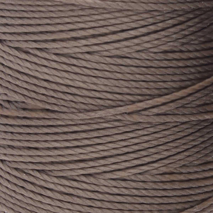 Close-up of twisted 3-ply strands of cocoa brown nylon bead cord wound tightly