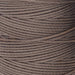 Close-up of twisted 3-ply strands of cocoa brown nylon bead cord wound tightly