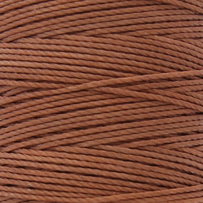 Close-up of the twisted copper nylon bead cord windings showing the 3-ply texture