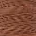 Close-up of the twisted copper nylon bead cord windings showing the 3-ply texture
