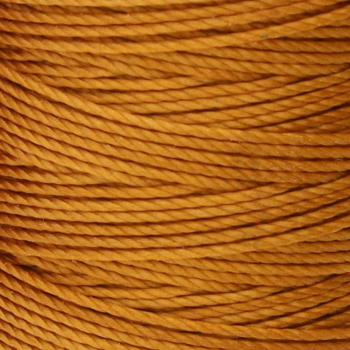 Close-up of twisted 3-ply texture on gold S-Lon nylon bead cord wound tightly