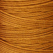 Close-up of twisted 3-ply texture on gold S-Lon nylon bead cord wound tightly