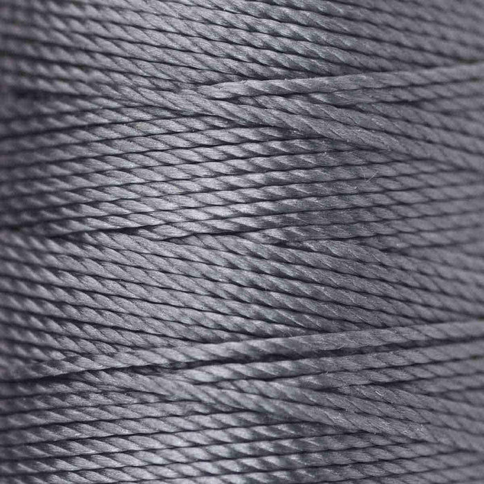 Close-up of twisted 3-ply strands on grey S-Lon nylon bead cord showing the cord texture