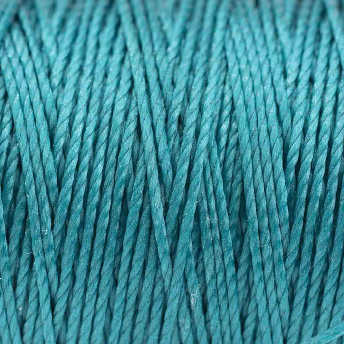 Close-up of twisted 3-ply teal S-Lon nylon cord wound tightly, showing the strand texture