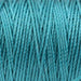 Close-up of twisted 3-ply teal S-Lon nylon cord wound tightly, showing the strand texture
