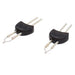Pair of black-based metal replacement tips with wire loops, angled view on white background