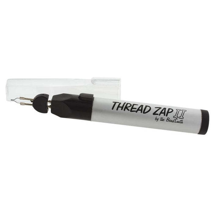 Thread Zap II by BeadSmith burner with cap alongside its metal heating tip, shown from the front