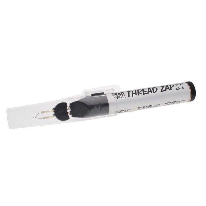 Thread Zap II thread burner with cap clipped on, showing the label and the tip at an angle