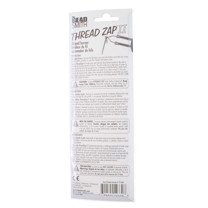 Back of the Thread Zap II thread burner packaging with instructions and caution text