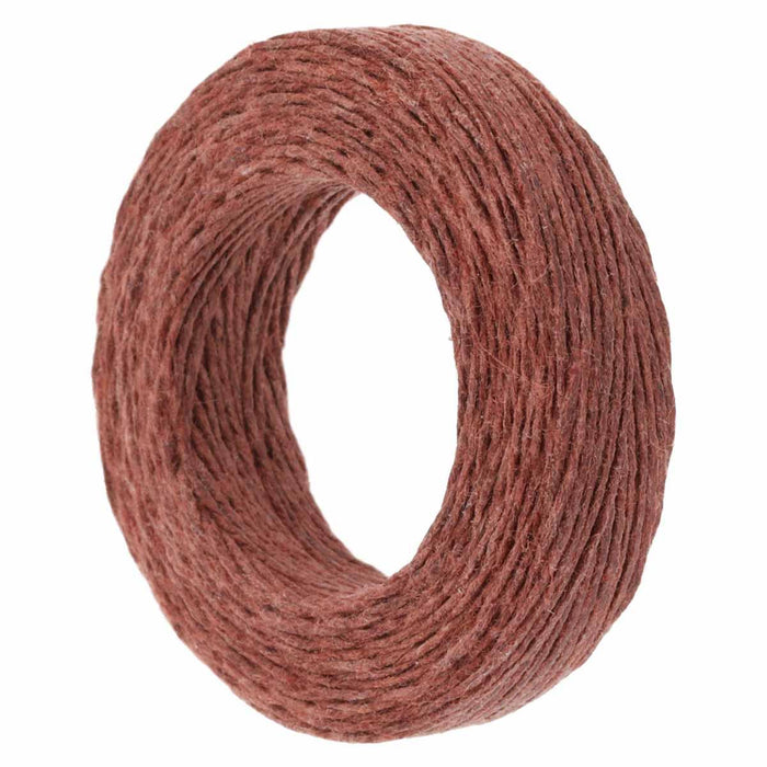 Brown waxed linen cord coil, angled side view showing the cord's textured waxed finish