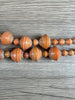 Hidden Gems: Assorted Orange Paper Beads