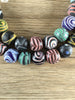 Hidden Gems: Large Matte Java Glass Feather Beads