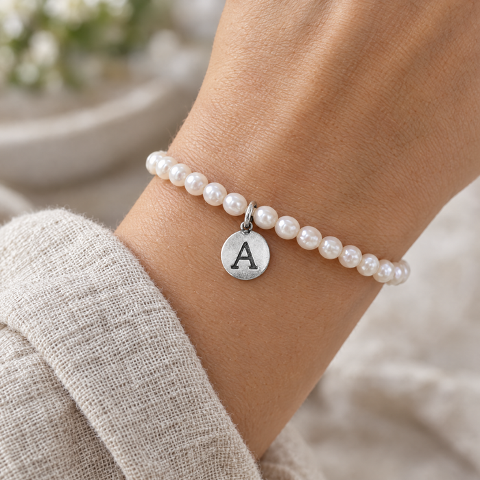 Antiqued silver letter A charm on a pearl bracelet, design idea