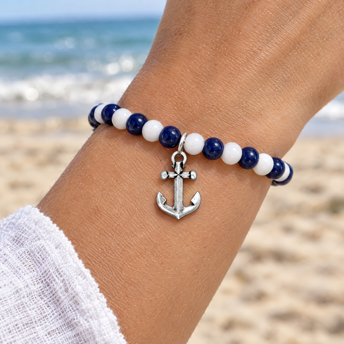 Antiqued silver anchor charm on a navy and white bead bracelet, design idea