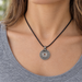 Antiqued silver Asian coin charm on a black cord necklace, design idea