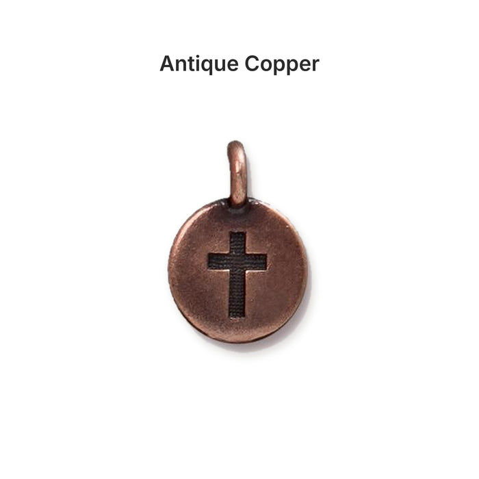 Antiqued copper cross coin charm, front