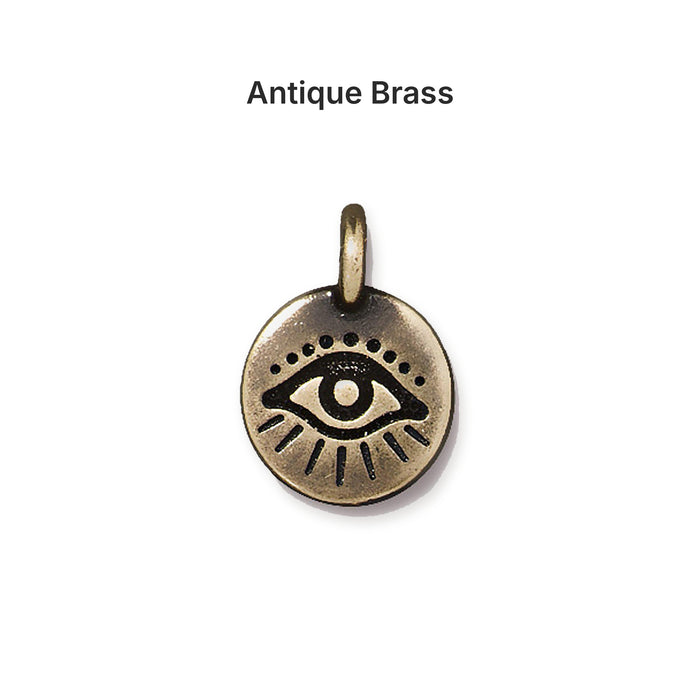 Antiqued brass evil eye coin charm, front