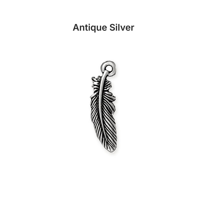 Antiqued silver feather charm, front