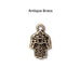 Antiqued brass hamsa hand charm, front