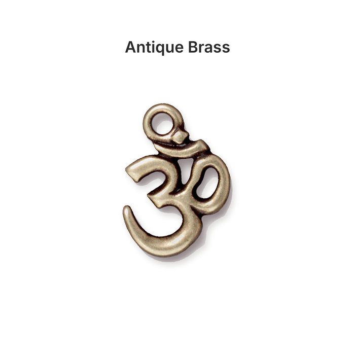 Antiqued brass open Om charm, front