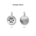 Antiqued silver paw print coin charm, front and back
