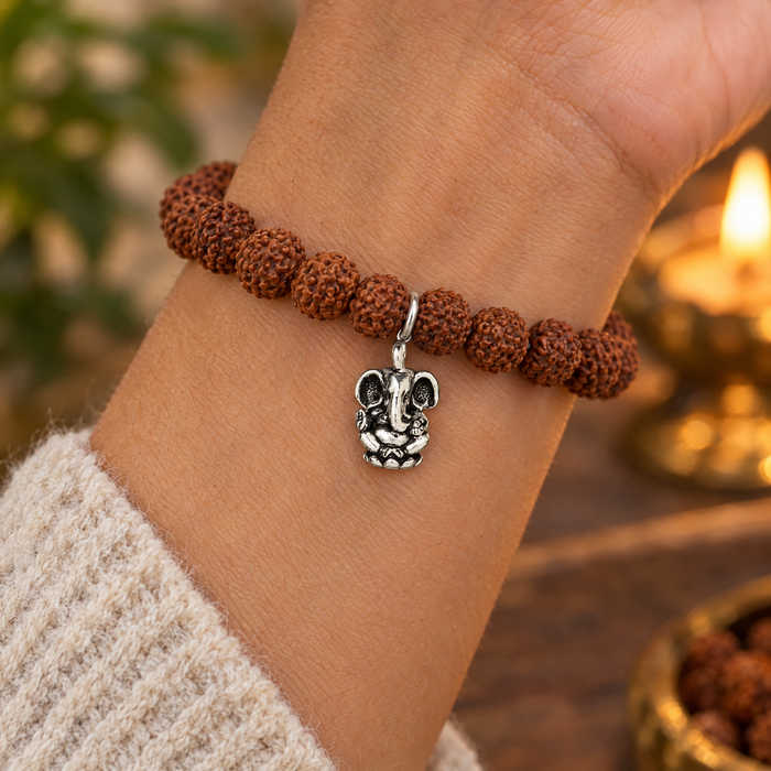 Antiqued silver Ganesh charm on a rudraksha mala bracelet, design idea