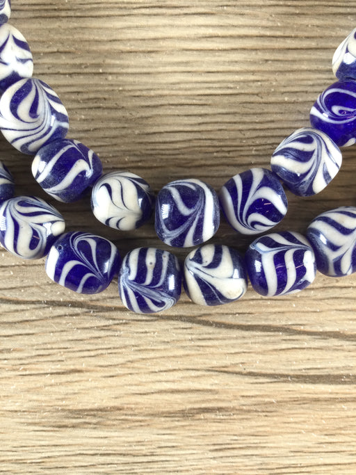 Hidden Gems: Cobalt Blue Round Feather Java Glass Beads