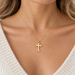 Gold plated cross charm on a gold chain necklace, design idea