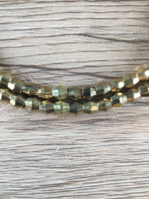 Hidden Gems: Miniature Brass Bicone Beads