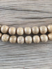 Hidden Gems: Round Beige Nepal Lotus Beads