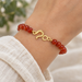 Gold plated hammered hook and eye clasp on a carnelian bead bracelet, design idea