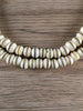 Hidden Gems: Brass Inlaid White Bone Beads