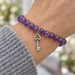Antiqued silver skeleton key charm on an amethyst bead bracelet, design idea