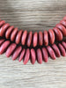 Hidden Gems: Red Ashanti Glass Saucer Beads