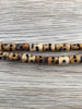 Hidden Gems: Brown Bone Skull Beads