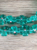 Hidden Gems: Aqua Java Eye Cross Beads