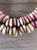 Hidden Gems: Fancy Ashanti Saucer Glass Beads