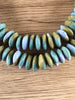 Hidden Gems: Fancy Ashanti Saucer Glass Beads