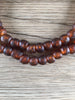 Hidden Gems: Amber Black Swirl Recycled Glass Beads