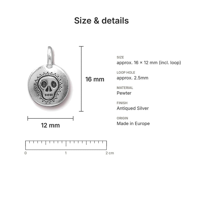 Antiqued silver skull coin charm size and details: 16 x 12 mm pewter, 2.5mm loop hole, made in Europe